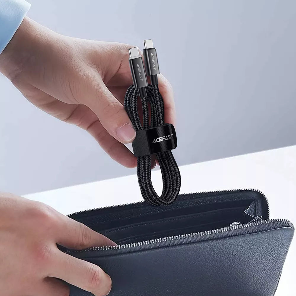 Black braided Acefast USB-C cable with a lit charging indicator.