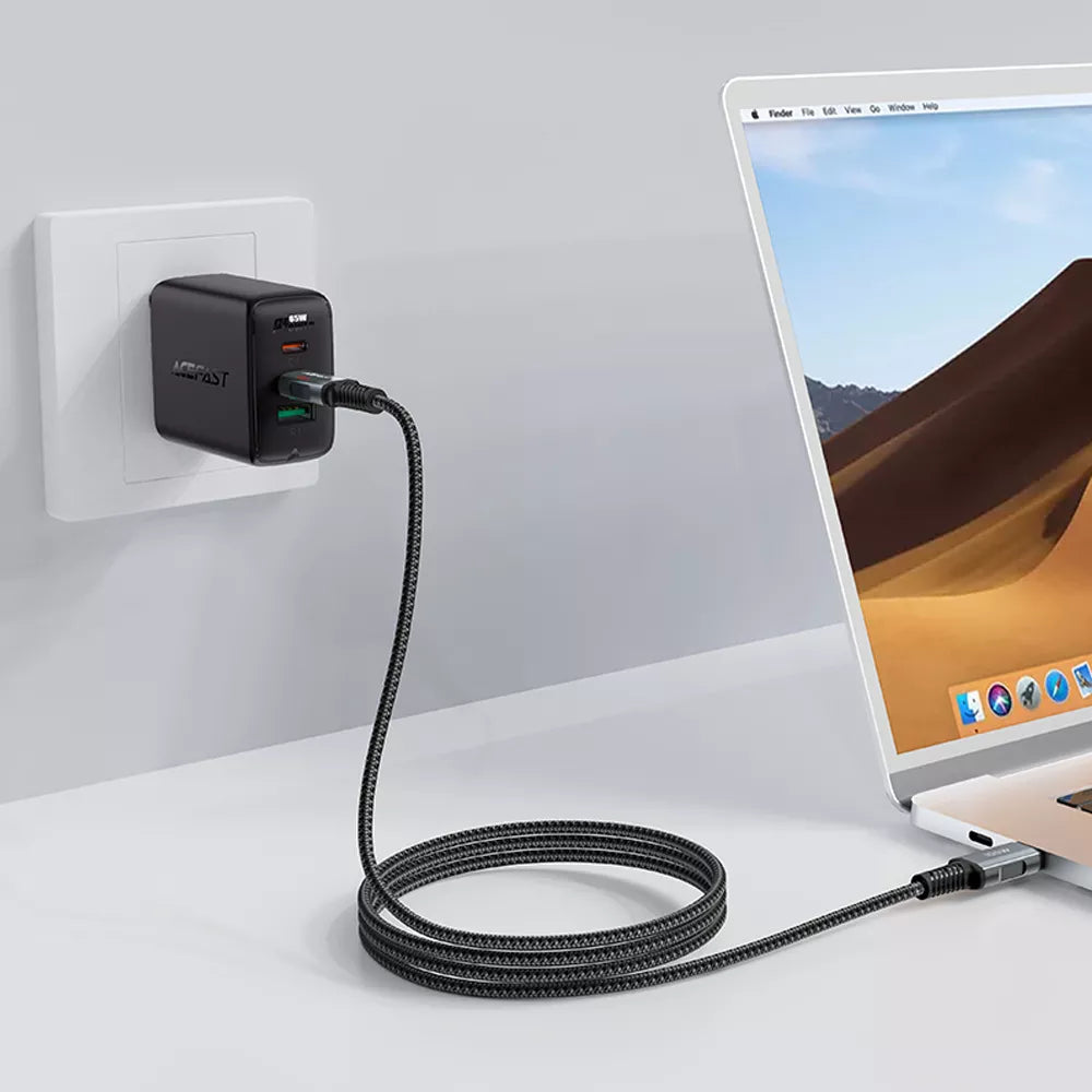 Two metre black braided Acefast USB-C cable coiled on a desk.