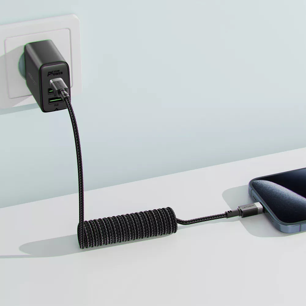 Black Acefast USB-C cable with a coiled spring anti-tangle section.