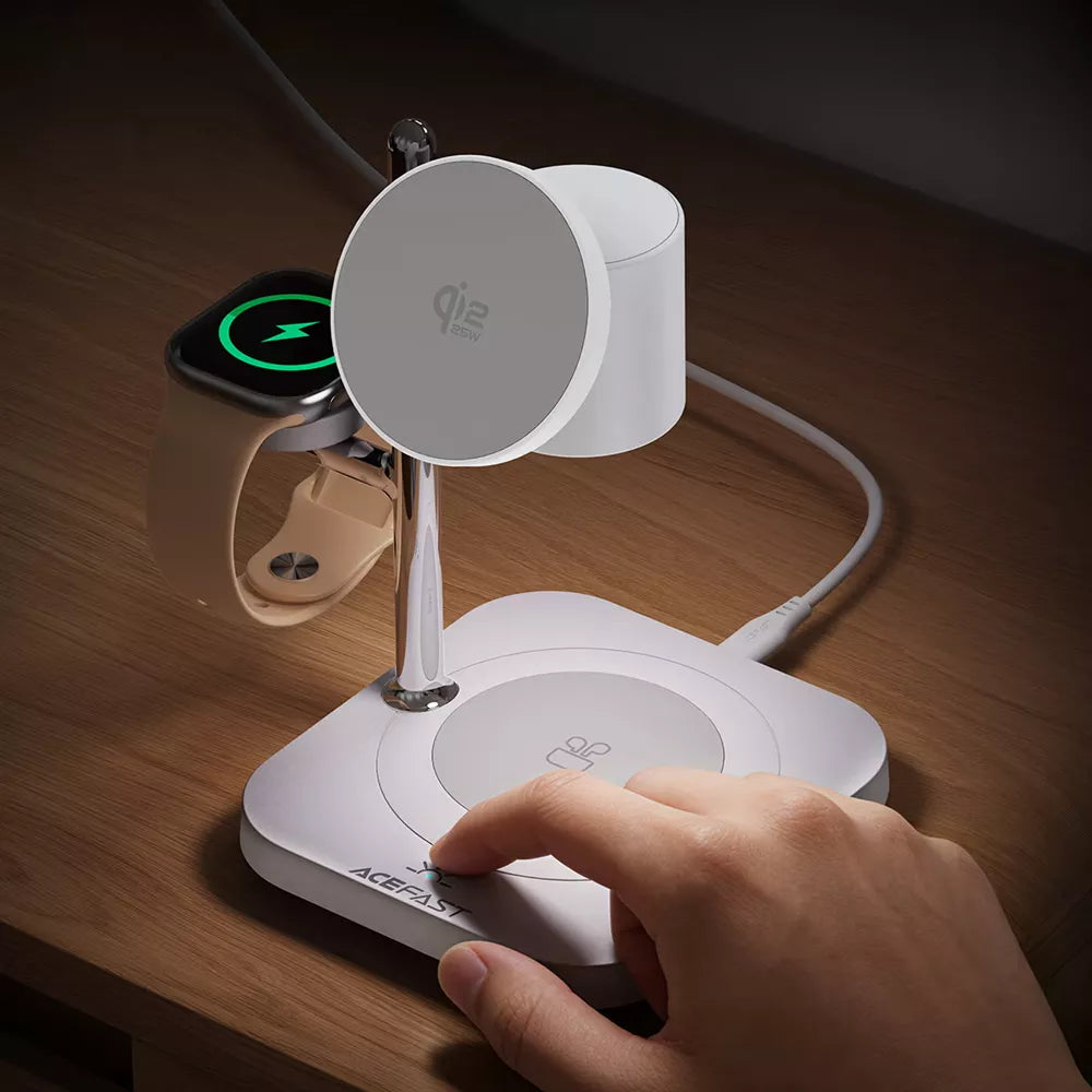 White Acefast Qi2 charging pad with an upright phone mount, earbuds area and watch pad.
