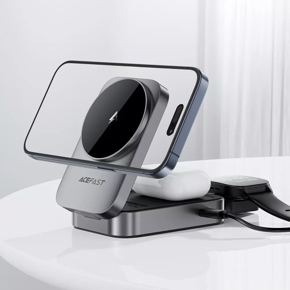 Grey Acefast folding charging station holding an iPhone, AirPods case and Apple Watch.