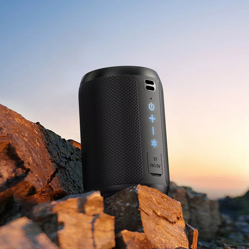 Black Acefast portable Bluetooth speaker with a fabric mesh grille, standing upright.