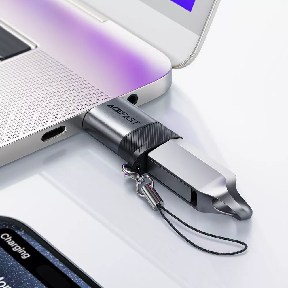Small aluminium Acefast adapter with a USB-C plug and a USB-A socket.