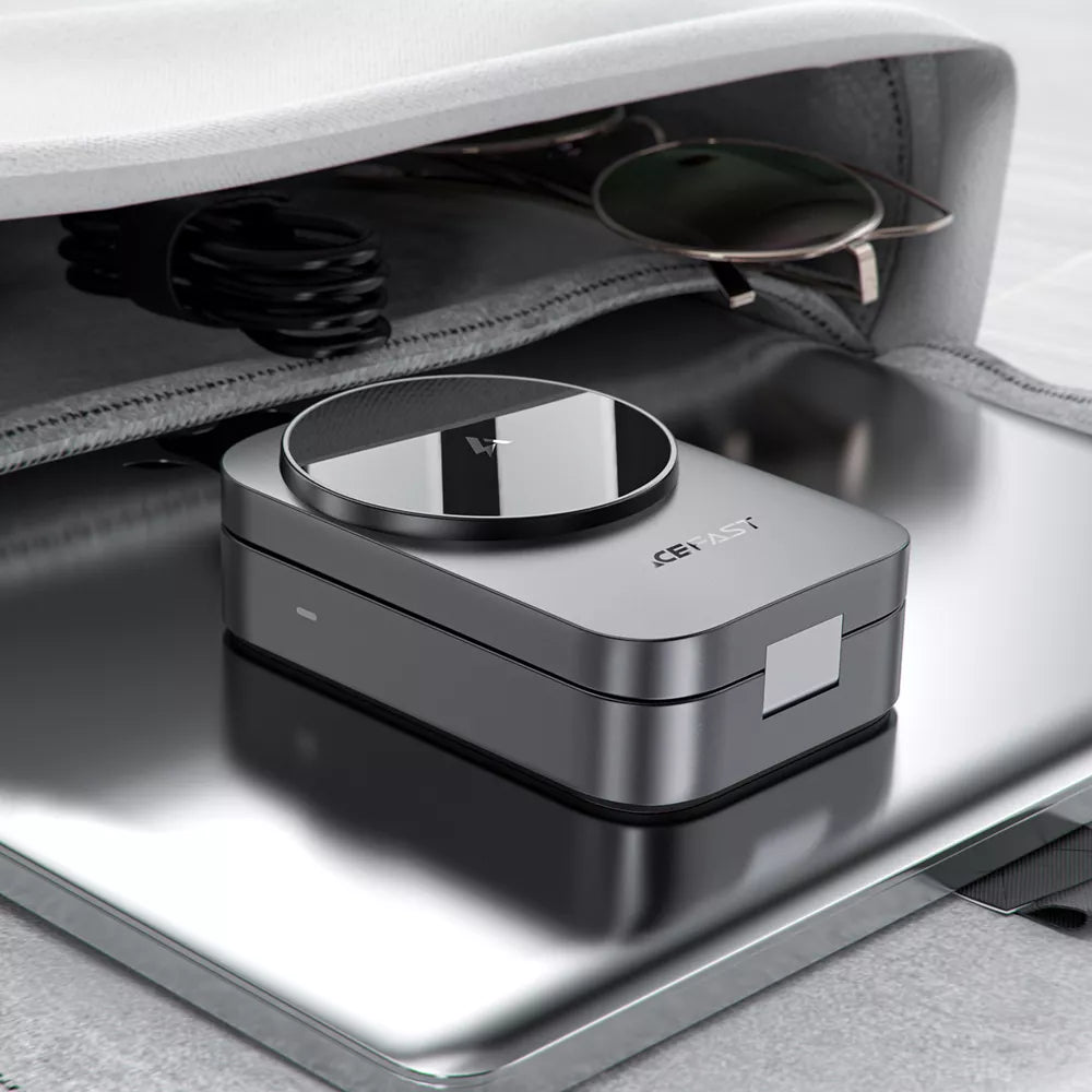 Grey Acefast folding charging station holding an iPhone, AirPods case and Apple Watch.