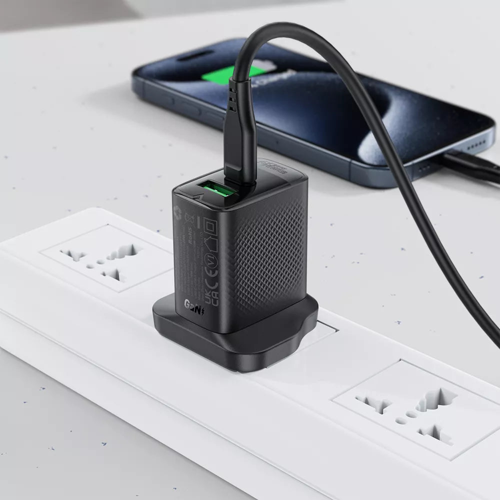 Black Acefast 20W UK plug with a USB-C and a USB-A port.