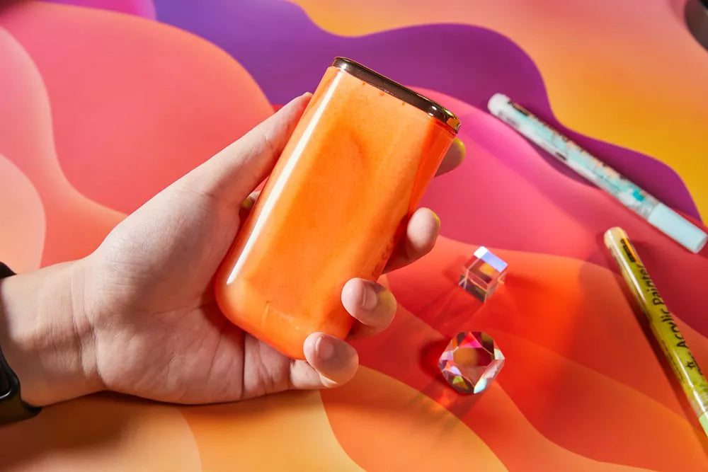 Acefast 10,000mAh power bank in bright Vitality Orange with LED display.